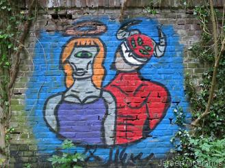 Artistieke graffiti op een muur in een grub. - Blogout